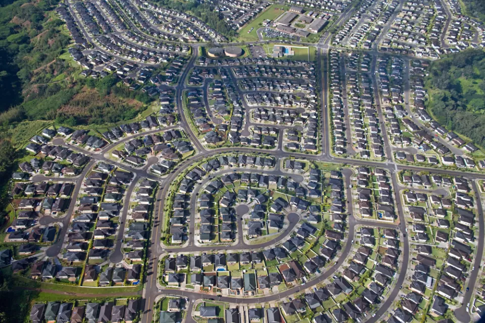 Aerial view of planned community with houses and winding streets in Pearl City, Oahu